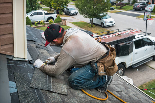 Professional Roofing technician working in Poland, ME